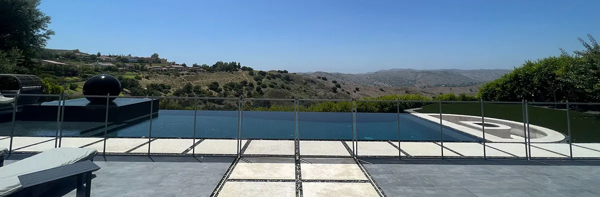 Glass balustrade around an elevated pool deck