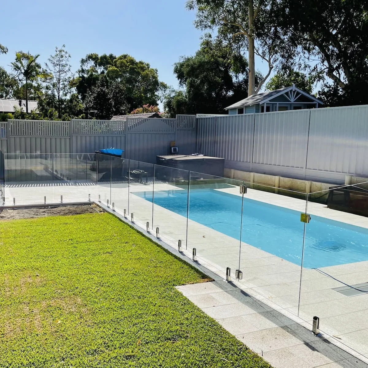 Newly installed frameless glass pool fencing